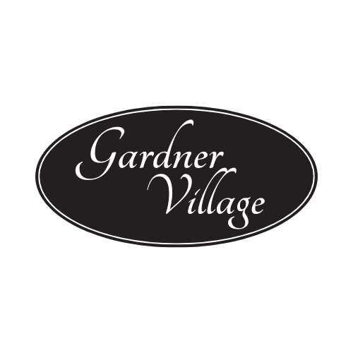 a logo for gardener village on a green background